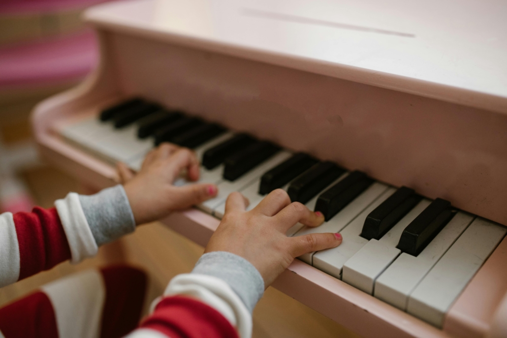 Young girl playing piano