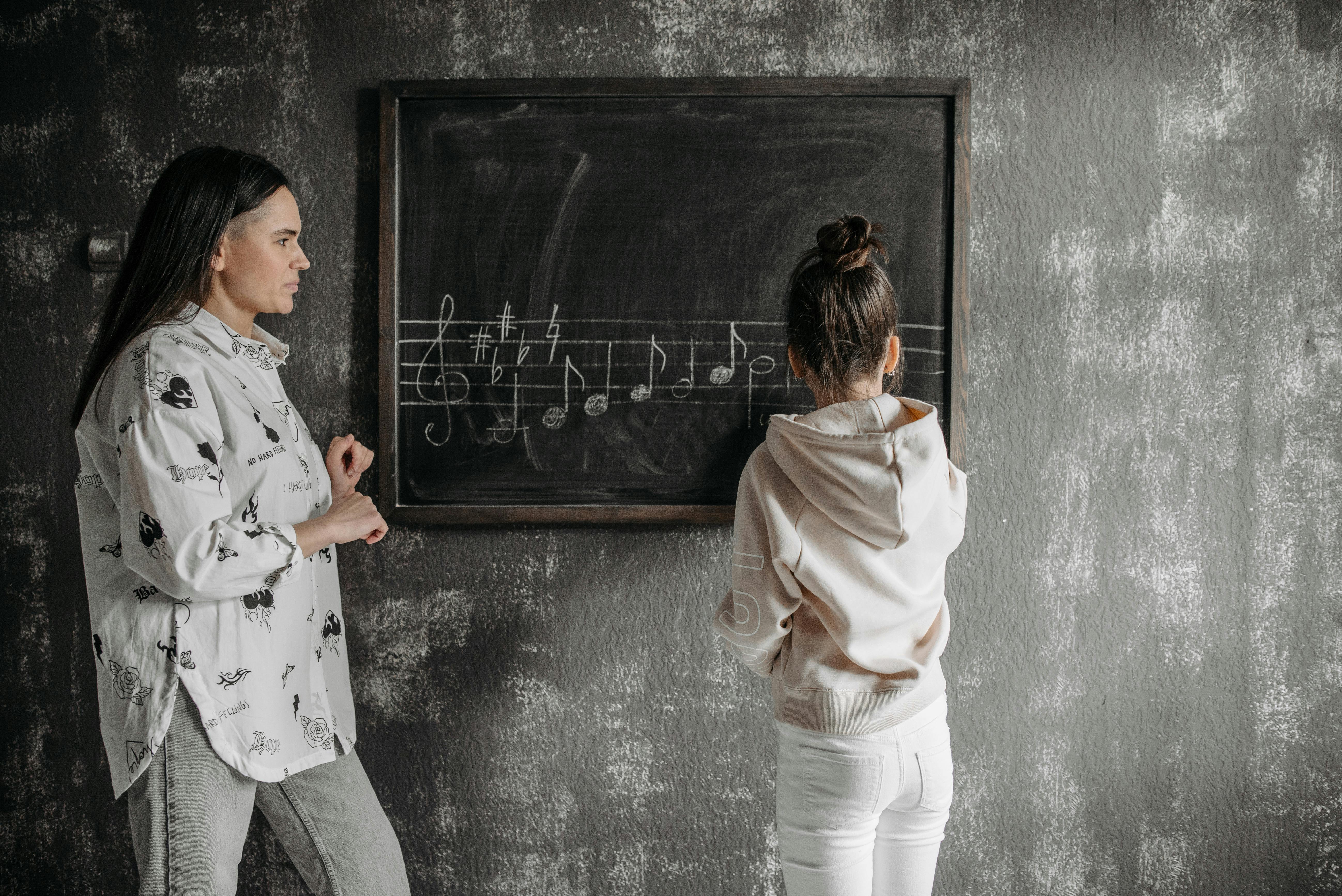 Young girl in a music theory lesson